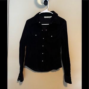 Fine black corduroy jean type jacket. Thin type